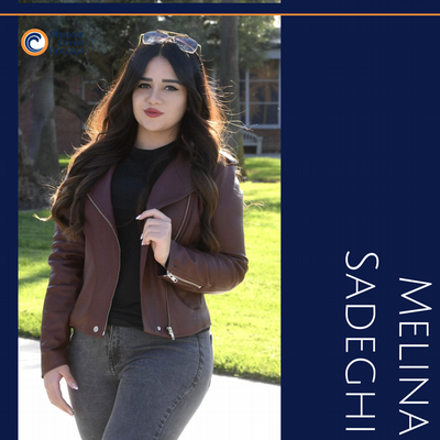 Student on campus, posing for their spotlight.