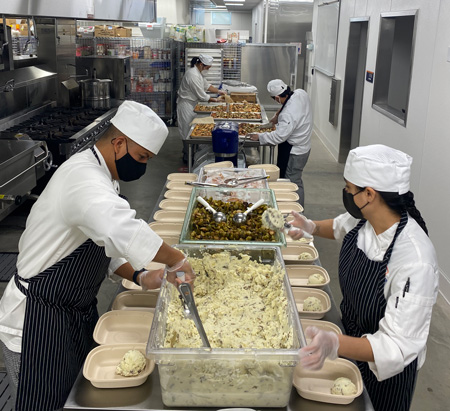 Workers in recovery kitchen