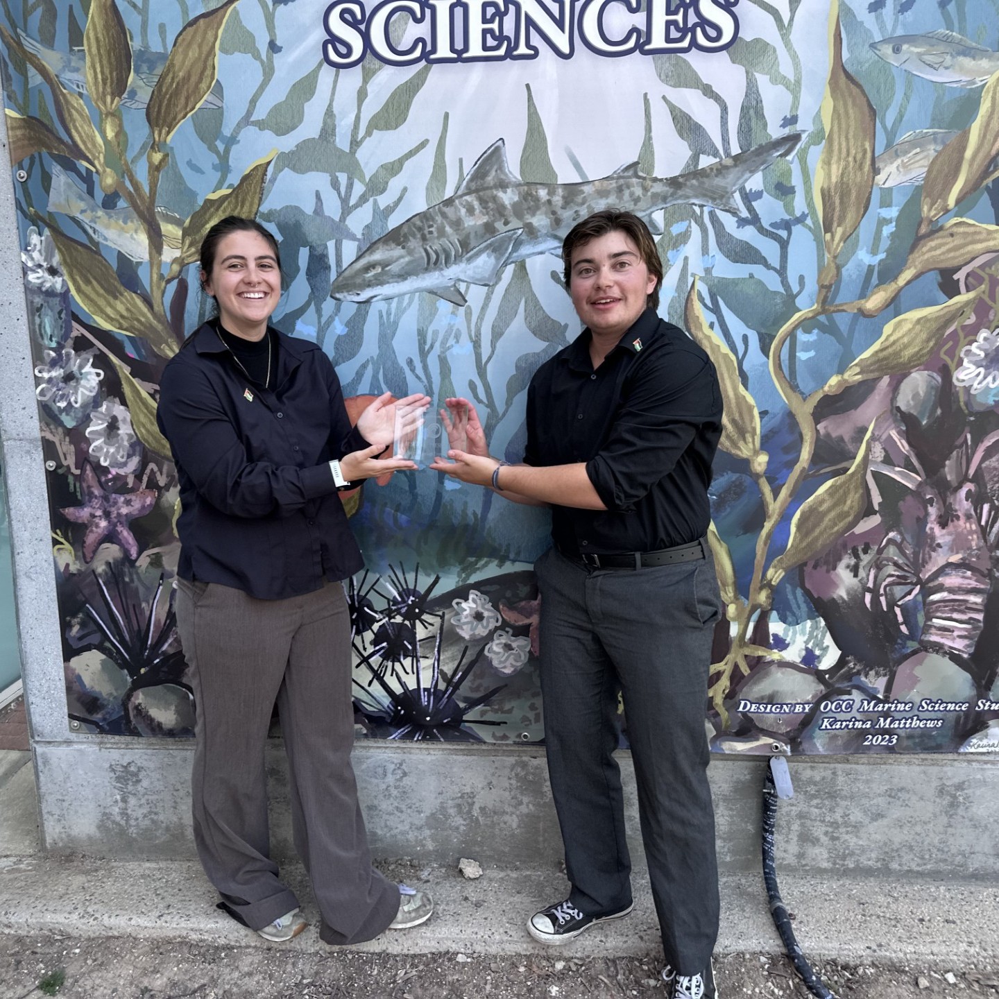 Two winning marine science students at the Student Research Symposium