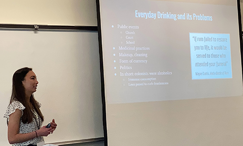 Student giving a presentation in a classroom