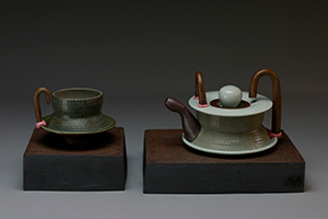 green tea set with cup and kettle