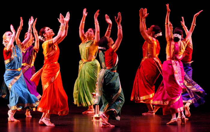 group of dancers from India dancing in a circle