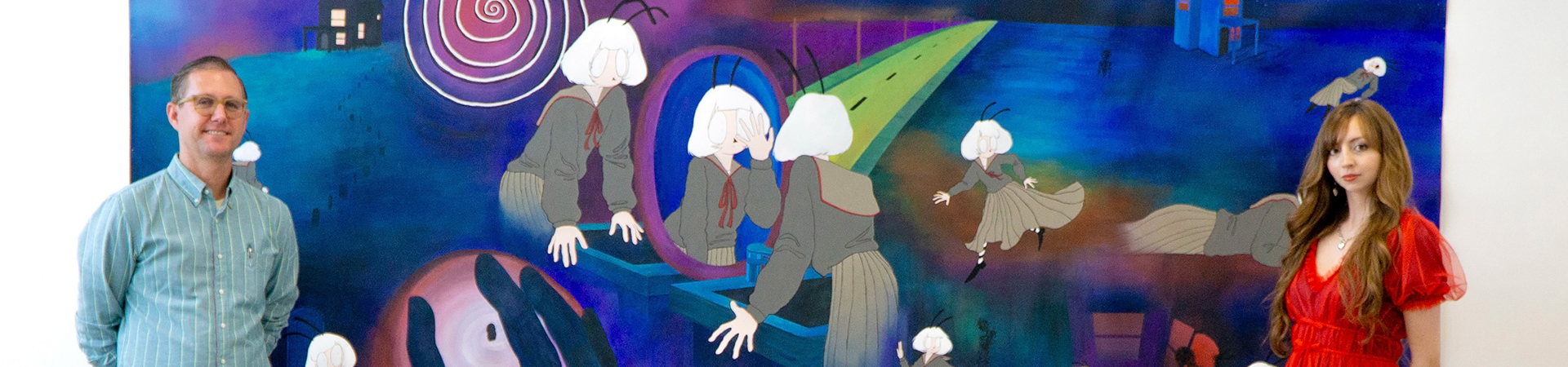 Art student and advisor standing in front of a large painting that was supported by endowment funding.