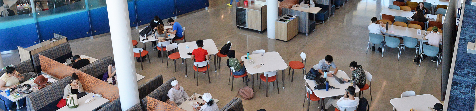 Students in the College Center dining area viewed from 2nd floor