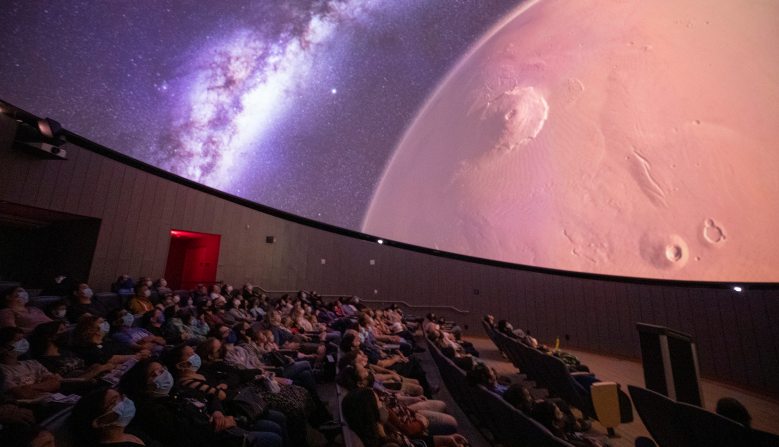 Dome Theater showing with an audience.