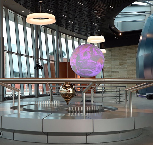 The lobby with view of pendulum and science on a sphere