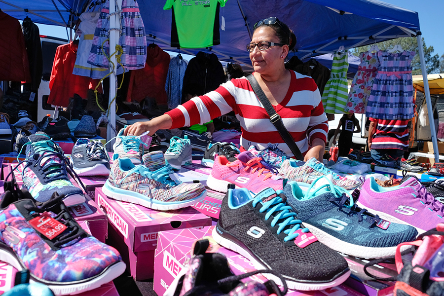 A vendor selling shoes