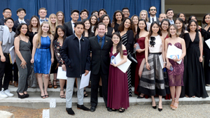 Large group of students dressed formally for Honors Night event