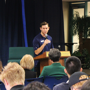 A student speaking in front of an audience