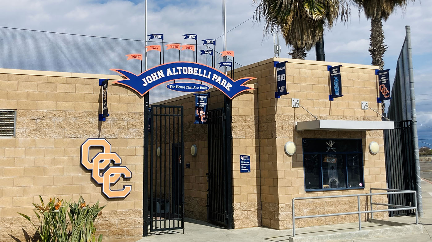 photograph of entrance of baseball facility with sign that says john altobelli park