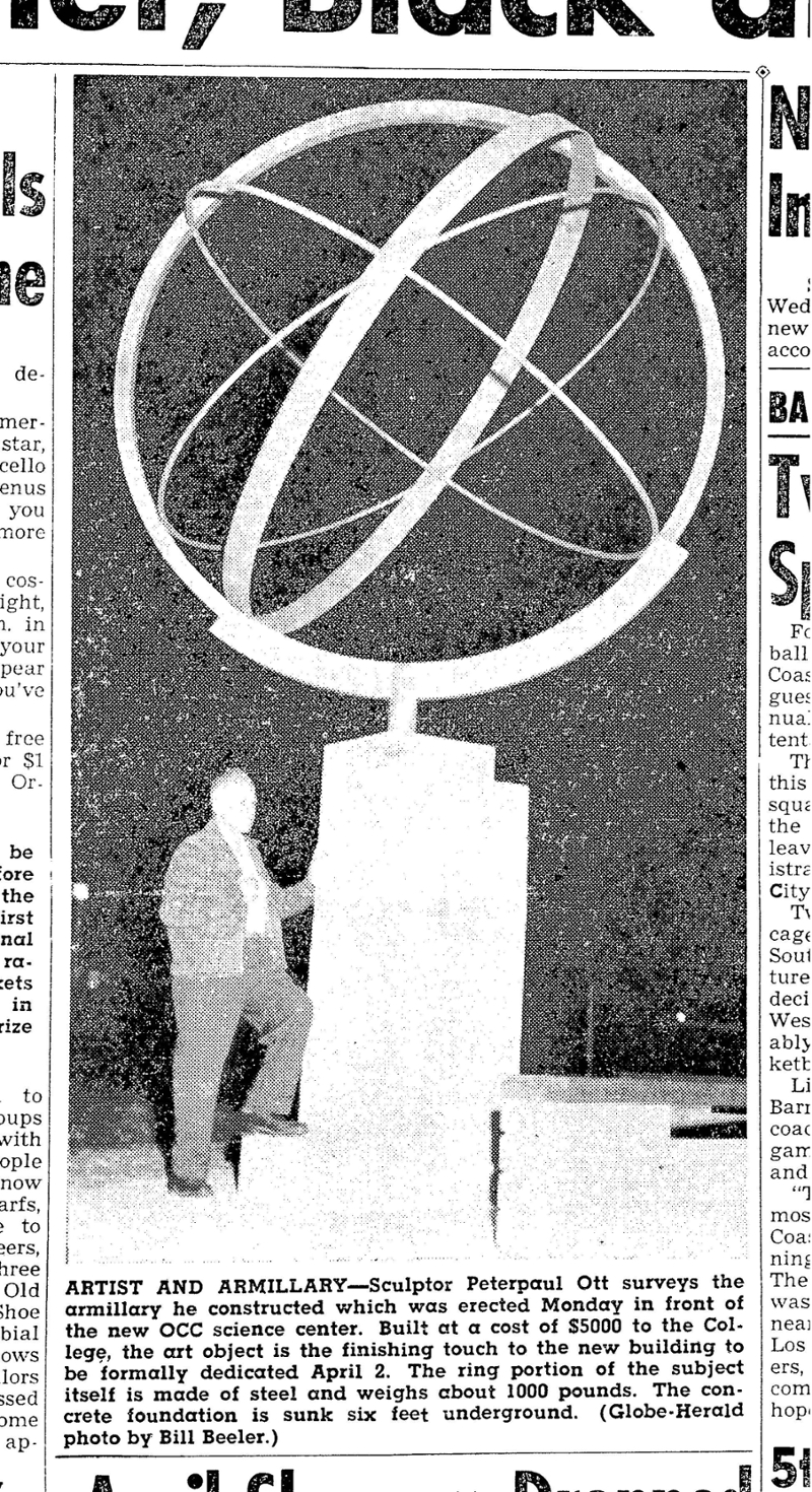 newspaper article that has a photo of a globe structure