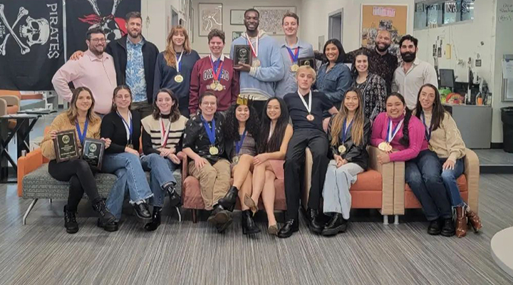 OCC's Speech, Debate, and theatre team holding awards