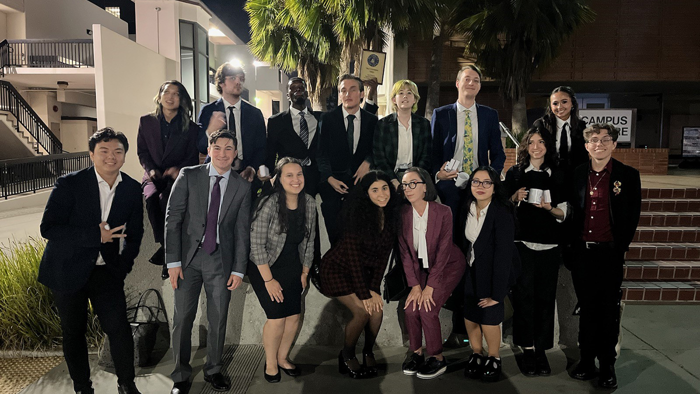 a group of people posing for a photo