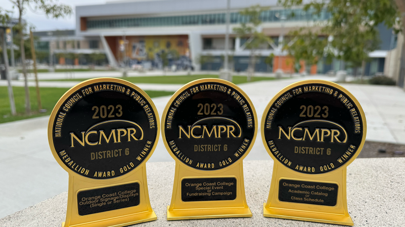 a group of trophies on a table