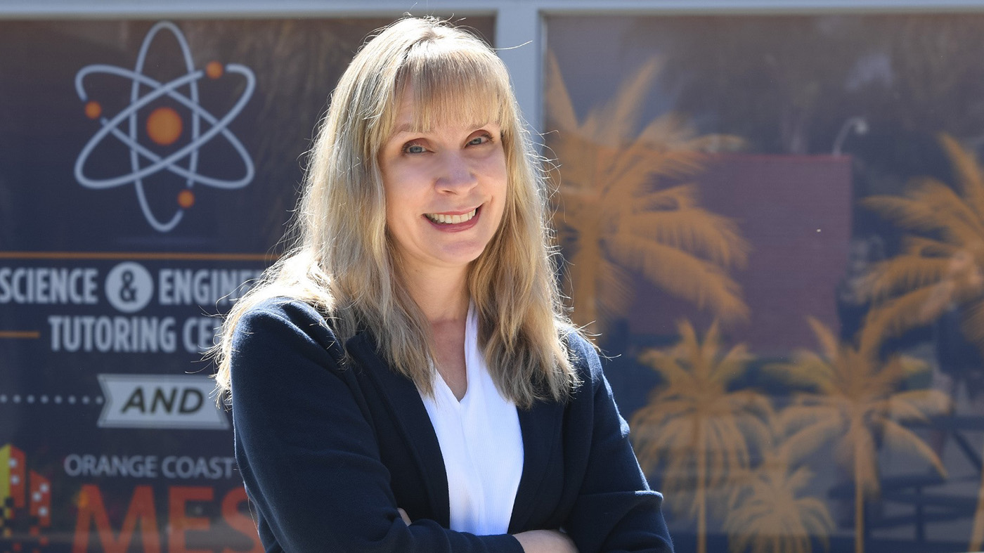 Woman standing in front of a window cling