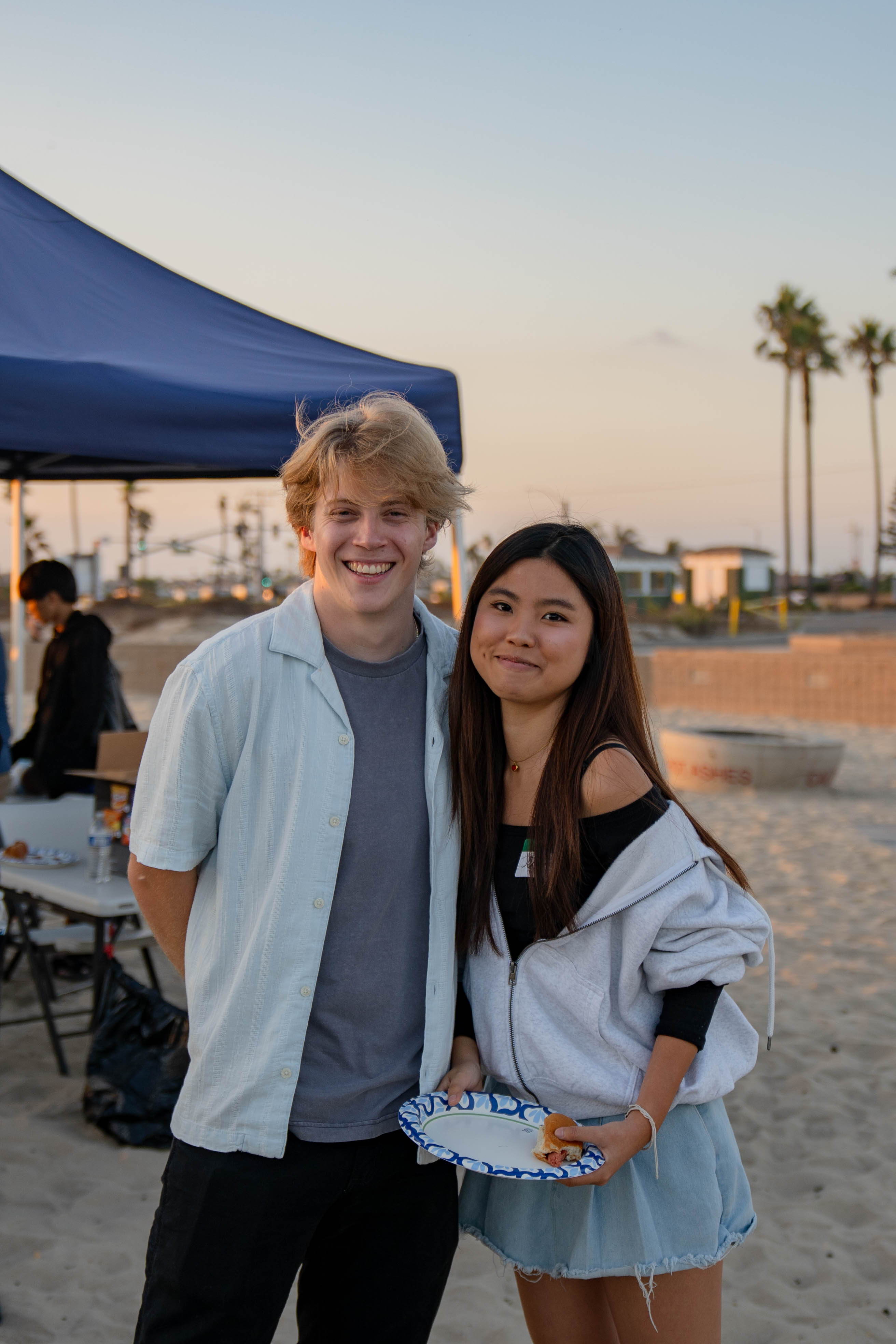 Two students taking a portrait photo