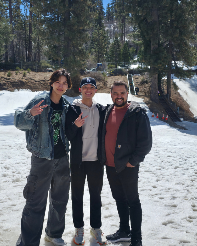 IEC Director posed for picture with his two other IEC students