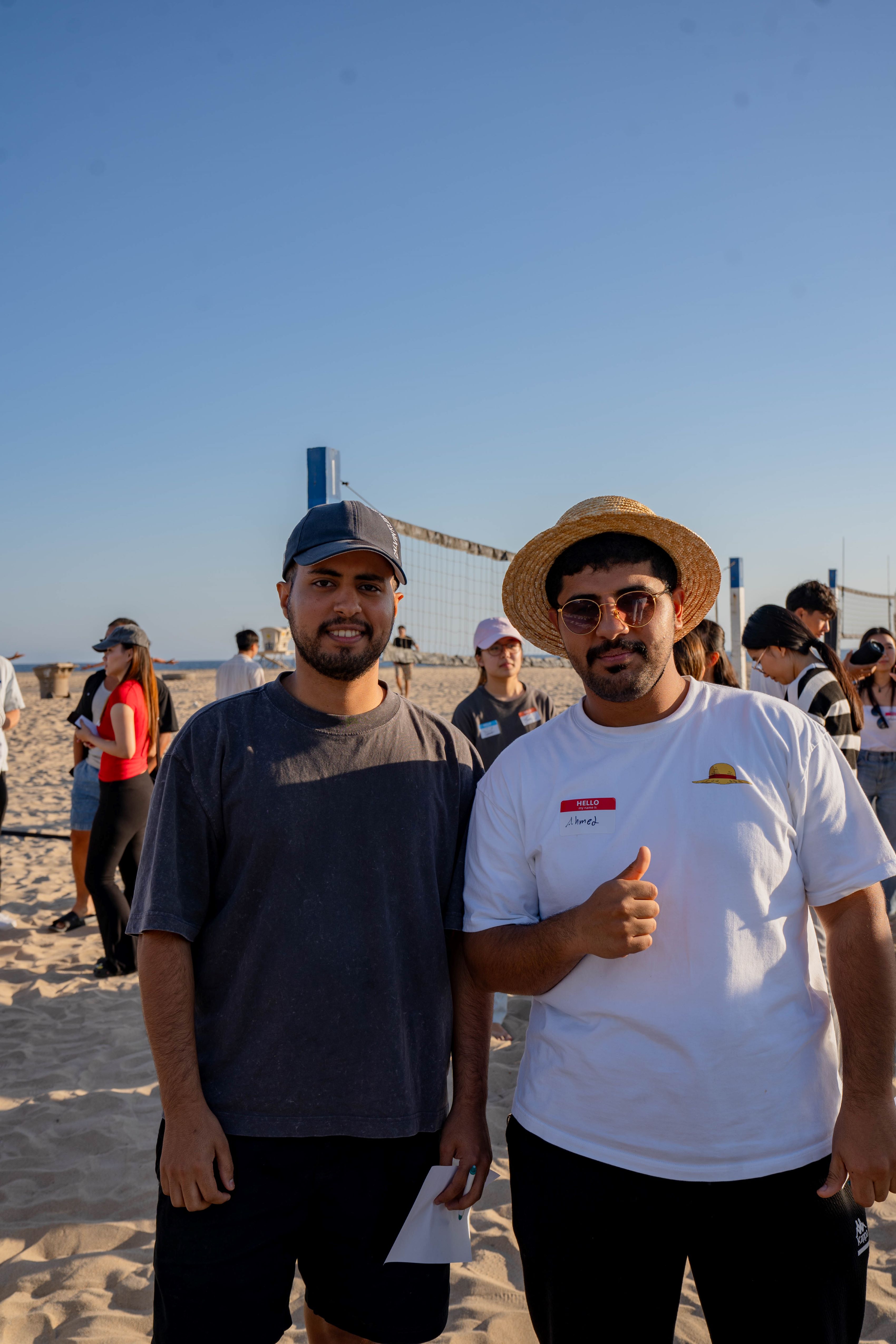 Two IEC students posing for photo with a thumb ups