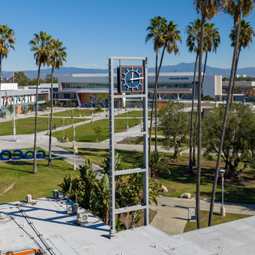 Aerial view of the orange coast college clock tower with main quad in background.