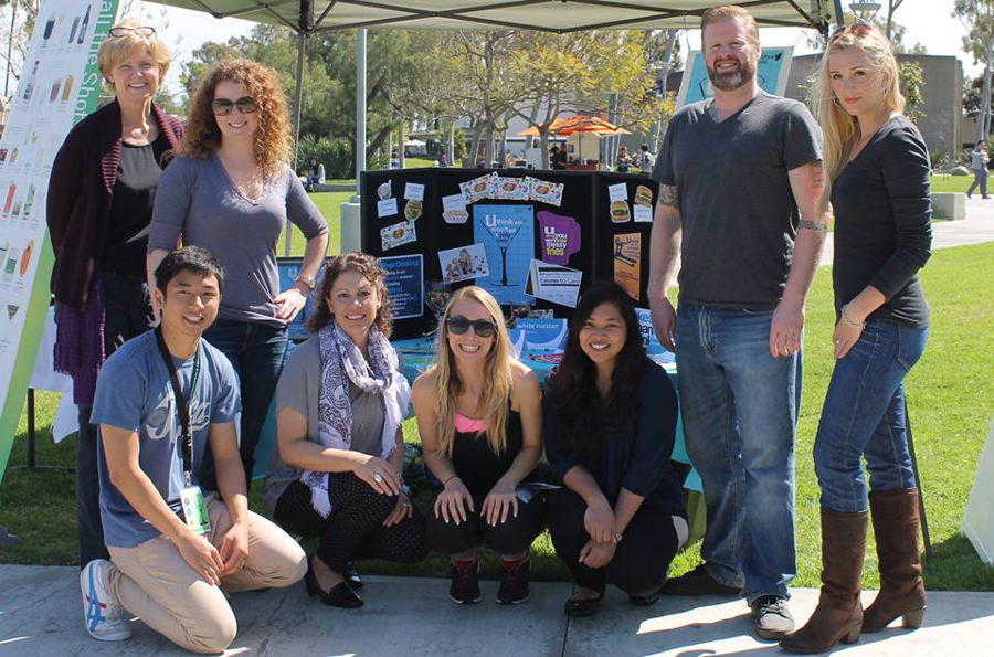 Group of peer health educators standing together at an event